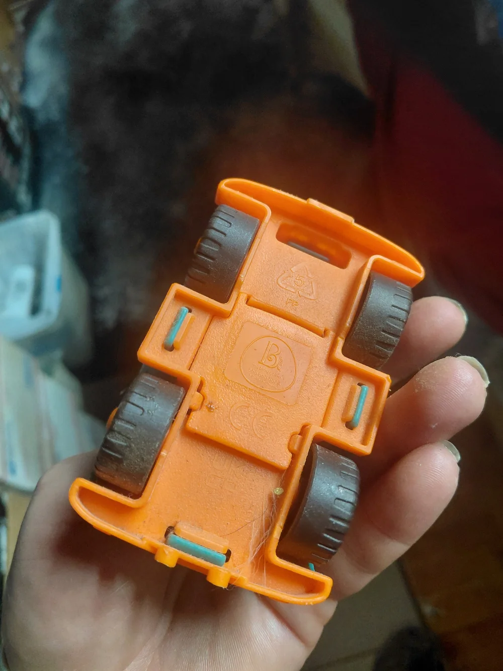 toy is a pickup truck from the B. toys Happy Cruisers collection